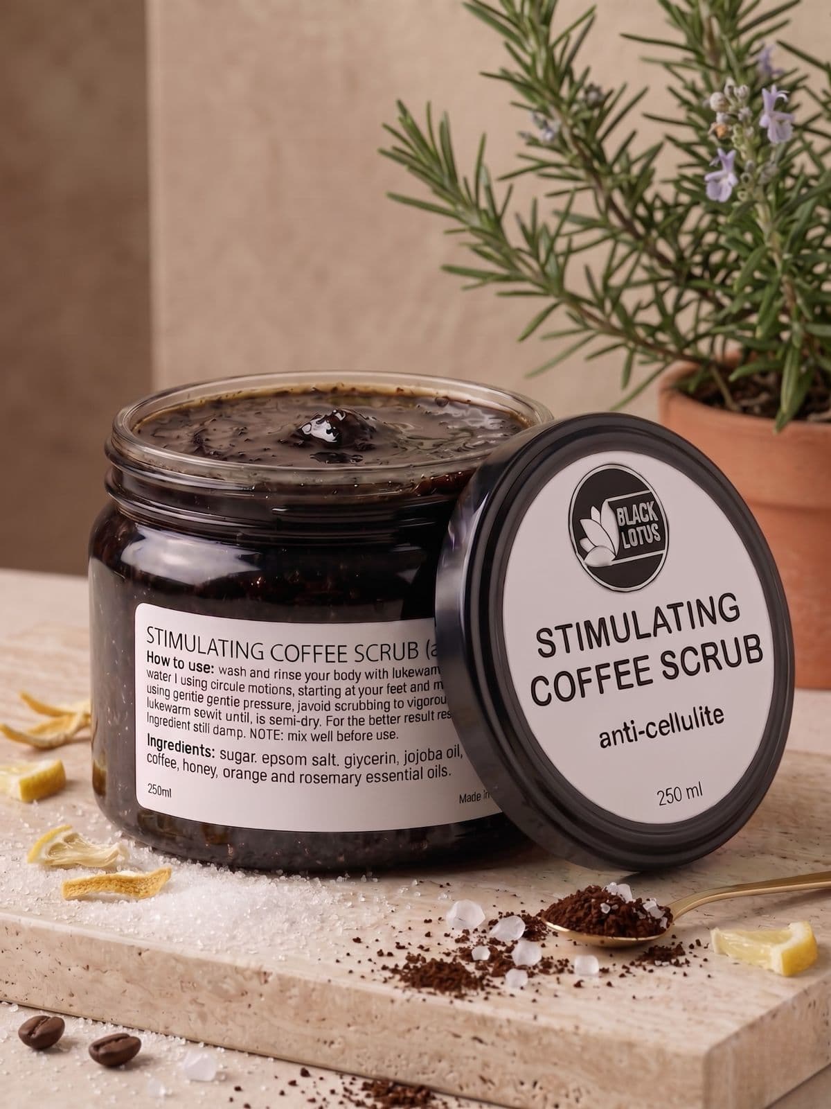 Black Lotus stimulating coffee scrub, styled with coffee beans